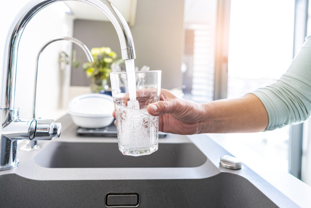 Filling Glass Of Water From The Tap