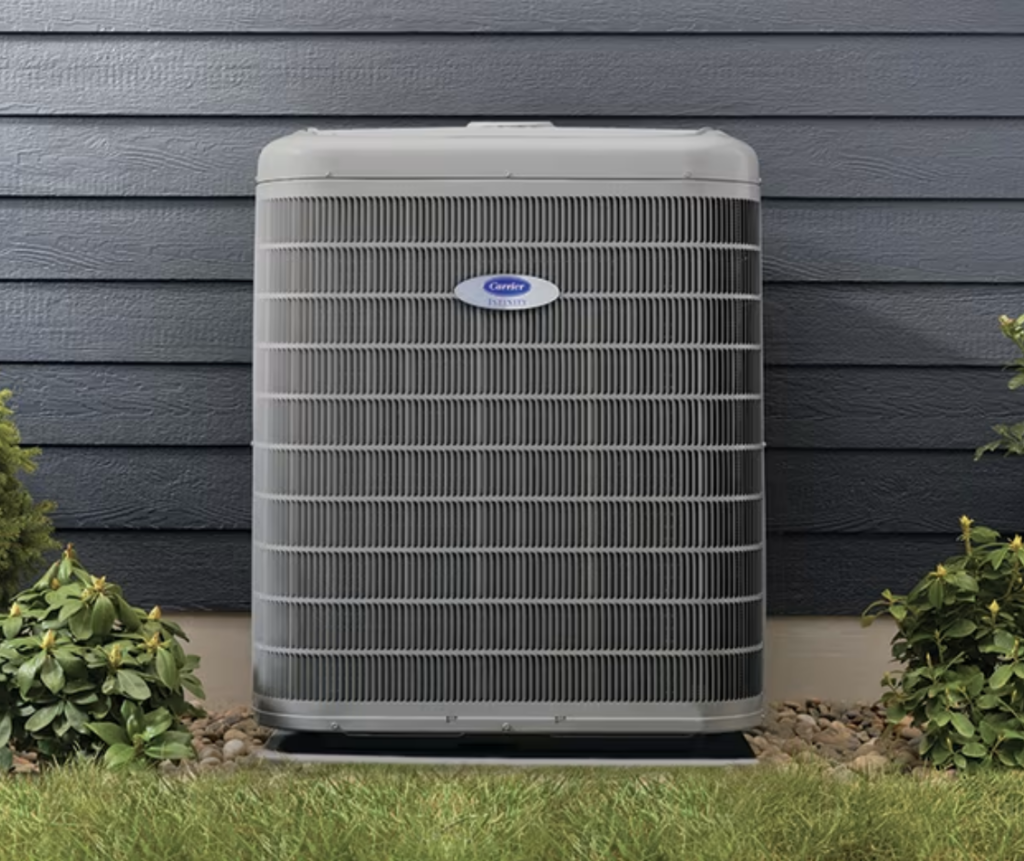 Carrier Air Conditioner Outside A Home Shows How Long Do Air Conditioners Last